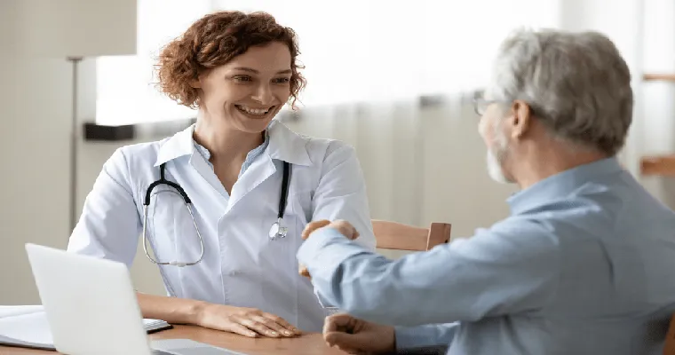 What questions should a caregiver ask when they go to the doctor with an elderly parent?